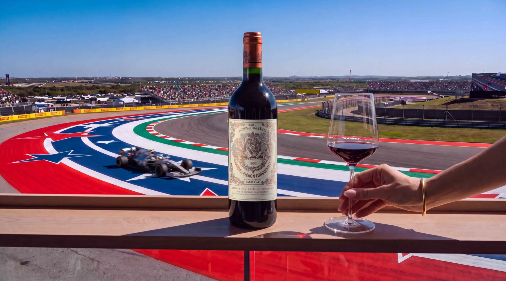 A glass of Pichon Baron overlooking Circuit of The Americas